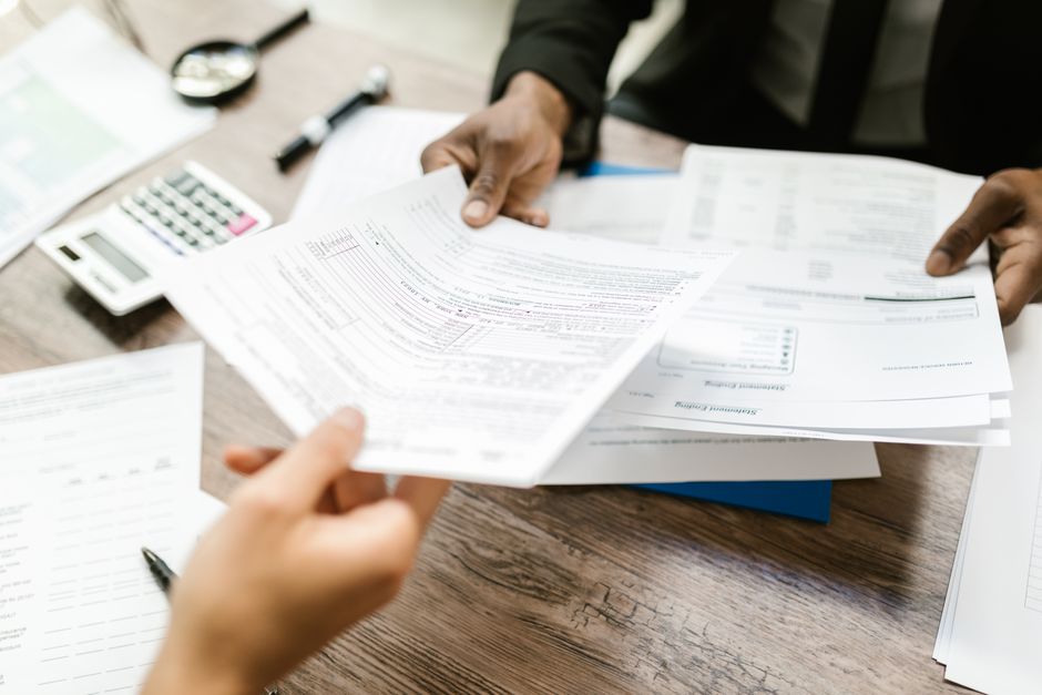 Insurance renewal documents on desk
